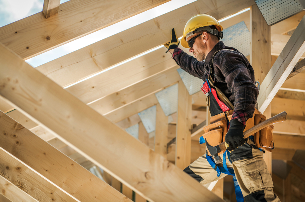 construction worker standing on building