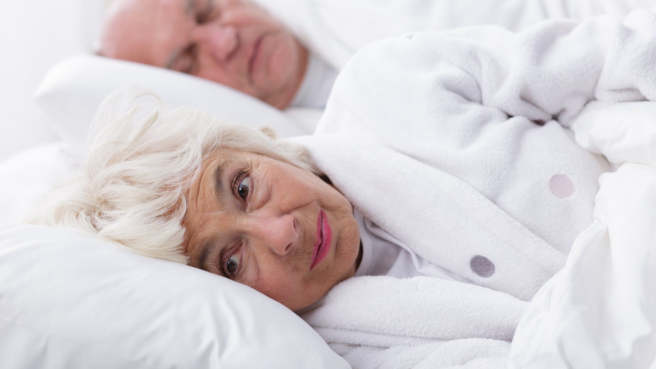 arthritis pain affects older woman sleeping